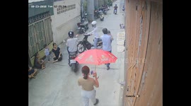 Brazen thief on motorcycle snatches woman's iPhone as she walks down alley