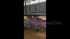 Couple get soaked in unusual gender reveal tactic