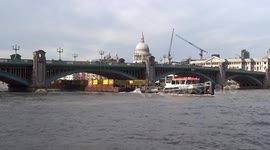 Thames barge going from Southwark Bridge to London Bridge