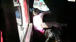 Newsflare Edit - Taxi driver caught using wrench as steering wheel