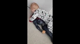 Child Kissing or eating superman ?