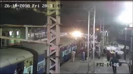 Indian police officer saves man hanging from moving train