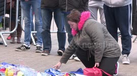 Leicester fans light candles for club owner after helicopter crash