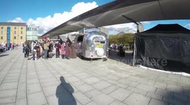 Cosplayers Queue For Food