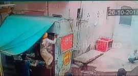 Snake charmer chases monkey after it snatches his cobra