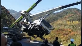 Thrilling scene as crane driver jumps off falling machine during rescue attempt