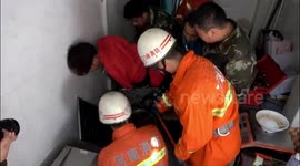 Chinese firefighters free man with arm trapped in noodle-making machine