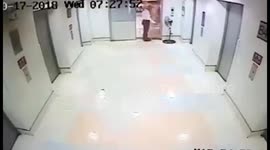 Security guard jumps for his life as SUV smashes through hospital door