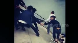 Passersby form human chain to rescue drowning girl