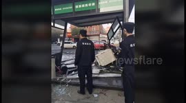 Out-of-control car ploughs into security booth injuring two