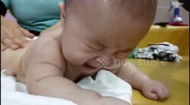 Baby Crying When He is Having a Back Massage at Baby Spa