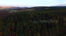Aerial 4K view of beautiful late autumn colours in the Scottish Highlands