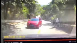 Car loses control on slope and slides down before flipping over