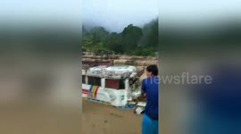 Newsflare Edit - Dozens trapped in landslide after Typhoon Yutu ravages northern Philippines