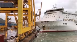 Ferry smashes into Barcelona dock, toppling giant crane