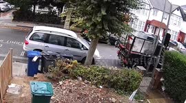 Brazen thieves caught stealing parked car by towing it away in broad daylight