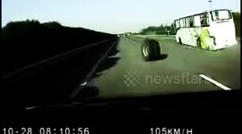 Coach tyres drop off and roll into motorway traffic, causing large crash