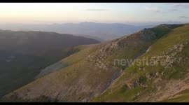 Going back from the top of mountain in Italy