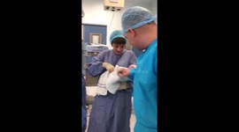 Man surprises girlfriend with proposal after giving birth