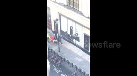 Moment man is stretchered out of Sony HQ by paramedics