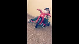 Cai pulling up on the trike