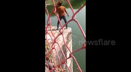Woman saved after jumping off bridge into river in northwest India