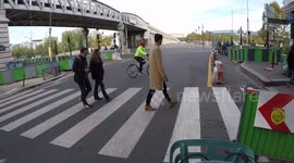 The Crazy speedy bike runner in Paris, locally known for singing very out loud all day and wearing this same yellow outfit, spotted in Boulevard Vincent-Auriol, Paris (3 november 2018).