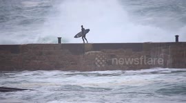 Surfer swept off his feet at Cornwall beach by strong post-Hurricane Oscar waves