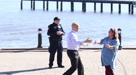 Sen. Booker Greets Supporter at Menendez Rally