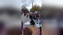 Protestors take a knee as national anthem plays outside Chattanooga Republican rally