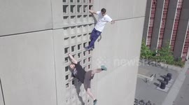 Daredevil climbers easily scale 10-floor apartment block in Denmark