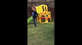 Getting splashed by looking into a hose!