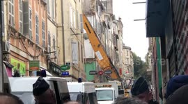 Authorities in Marseille begin cleanup operation after building collapse