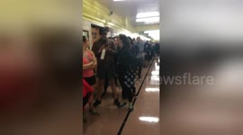 Long voting line snakes through corridors in Brooklyn after machines break