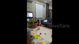 Toddler performs funny dance moves