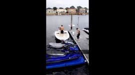 epic fail of kid trying to push kid off a boat