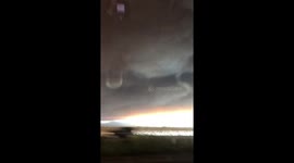Dark smoke over head looks like thunder storm