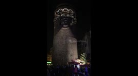 Light show on a stone tower