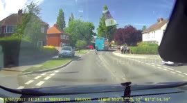 Teenage cyclist overtakes bus and cycles headfirst into moving car