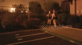 More than 4,000 firefighters work around the clock as Camp Fire kills 23 and ravages thousands of structures