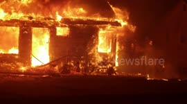 'Everything you can see is burned up!' Resident films buildings in flames as Camp Fire tears through Paradise