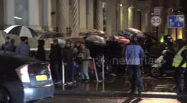 People Queue In Rain For Jollibee Food