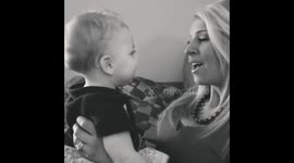 Old MacDonald had a PIG! Baby makes animal sounds, to mommy singing nursery rhyme.
