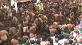 Indian villagers throw dung at each other for good luck in smelly festival