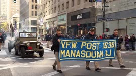 NYC: Military Jeep Drives in Veterans Day Parade