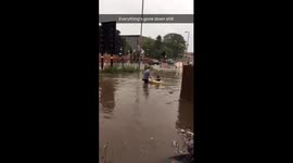 Student floats in a Rubber Dingy during the Selly Oak Floods-Part 2