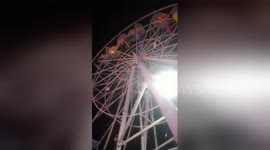 Newsflare Edit - Ferris wheel disaster as gondolas flip upside down with families inside