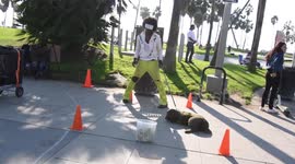 Venice Beach performer scares kid