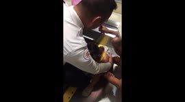 Harrowing moment two-year-old girl is rescued after getting fingers stuck in escalator