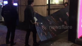Harry Potter fans seize giant poster from London premiere